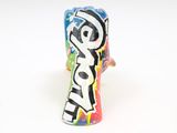 a small toy that has been painted with graffiti on it