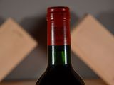 a bottle of wine that is sitting on a table