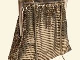 an image of a gold purse on a white background