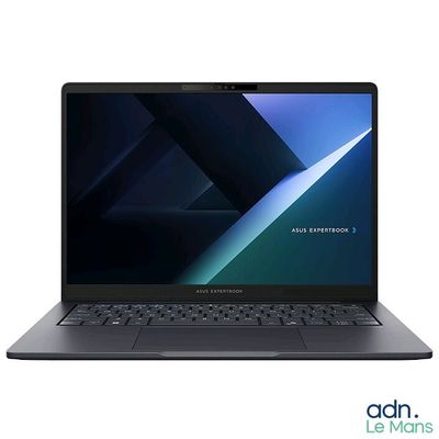 l'ordinateur portable est ouvert sur une surface blanche avec un clavier noir