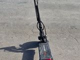 a scooter that is parked in the parking lot