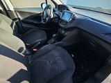 the interior of a car with a steering wheel and a dashboard