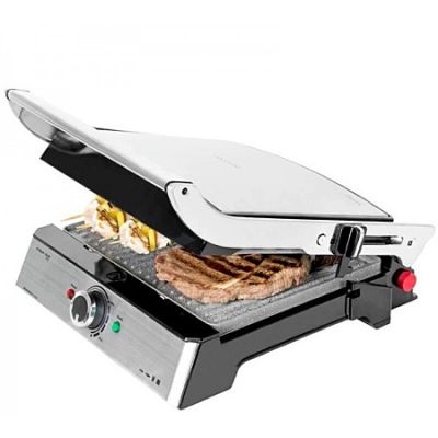un gros plan d'un grill sur lequel est posé un sandwich