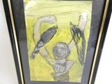 painting of a man holding a bird in his hand in a black frame