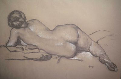 drawing of a nude woman laying down on her stomach