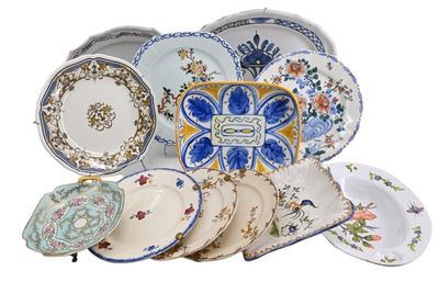 a lot of plates that are sitting on a table