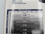 packaging of a pair of men ' s boxer briefs with a price tag