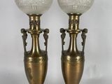 pair of antique brass vases with frosted glass globes