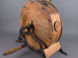 an image of a wooden barrel with a bunch of nails sticking out of it