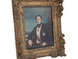 painting of a man in a suit and tie sitting in a chair