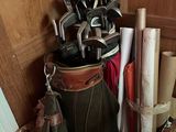 a bag of golf clubs and a bag of golf clubs on the floor