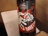 a bottle of beer that is sitting on a table