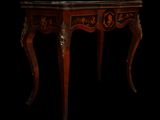 an antique wooden table with a marble top on a black background