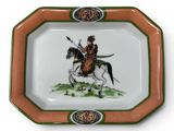 an image of a decorative plate with a man on a horse