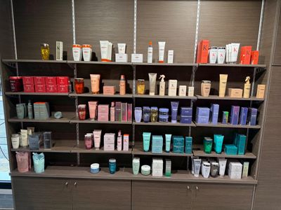 many different types of skin care products on the shelves