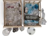 a wooden box filled with empty bottles and other items