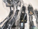 a lot of different types of electronic devices wrapped in plastic