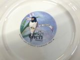 a plate with a picture of a bird on it