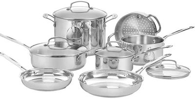 stainless steel pots and pans on a white background