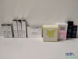 many different types of perfumes on the table