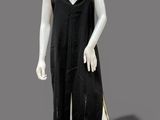 mannequin dressed in a black dress with gold trims