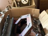 a cardboard box filled with assorted items in a room