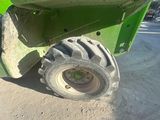 a tractor tire that is sitting on the ground