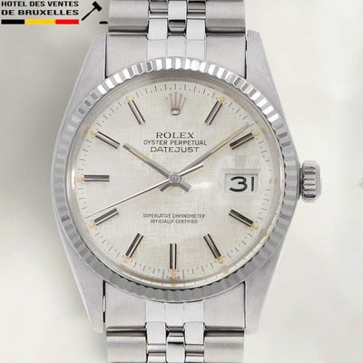 une image d'une montre Rolex avec un cadran blanc et des chiffres romains