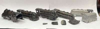 a bunch of toy trains sitting on a table