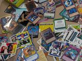 many different types of pokemon cards on the table