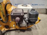 a small machine that is sitting on the ground