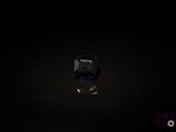 l'image d'un diamant noir dans l'obscurité