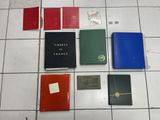 a lot of books that are on the floor