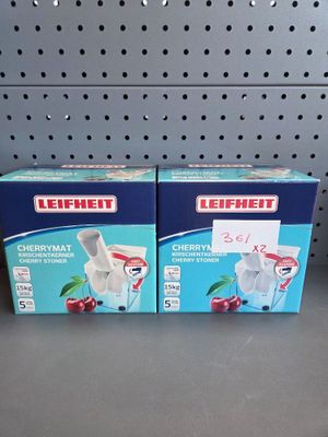 two boxes of lepreet cherry yogurt sitting on a shelf