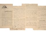un vieux bout de papier avec des mots écrits dessus, posé sur une table