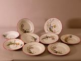 many plates that are sitting on a table