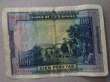 an old spanish bank note with a picture of a man on horseback