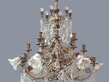 an image of a chandelier made of glass and metal