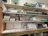 many shelves in the store with various items on them