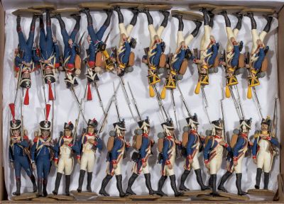 many toy soldiers that are in a box together