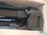 a video camera sitting in a box on a table