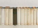 a lot of books that are sitting on a table