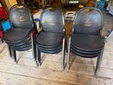 four chairs that are sitting on the floor in the garage