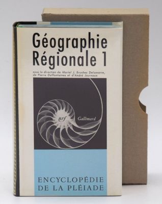 an image of a book sitting on top of a table next to a box