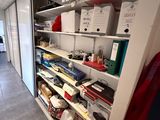 a room with a lot of boxes and boxes on the shelves