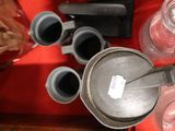 a red table with a bunch of different items on it