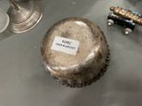 a silver container with a label on it sitting on a table