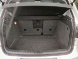 a trunk of a car with the back door open