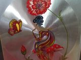 a picture of a picture of a woman holding a flower