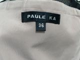 a close up of a label on a white jacket